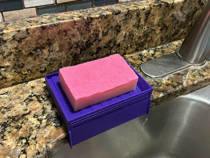 Self-draining sponge holder