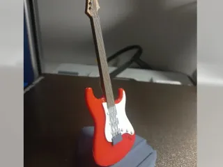 Guitar phone stand