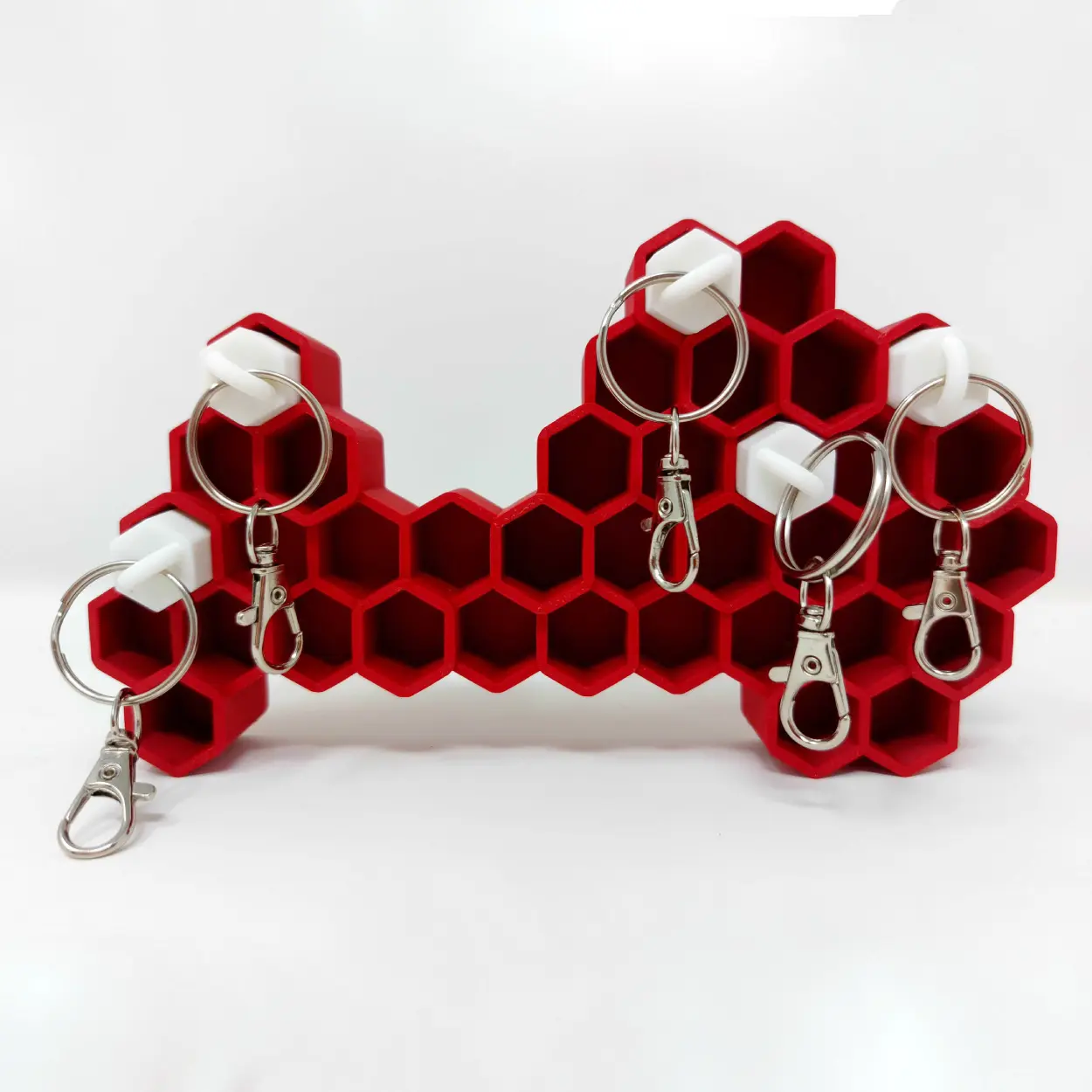WALL-MOUNTED HONEYCOMB KEY ORGANIZER WITH STYLISH KEYCHAIN