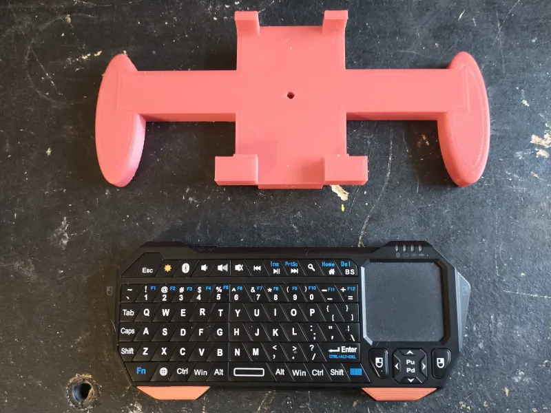 Fosmon Bluetooth keyboard grip with option for extras.