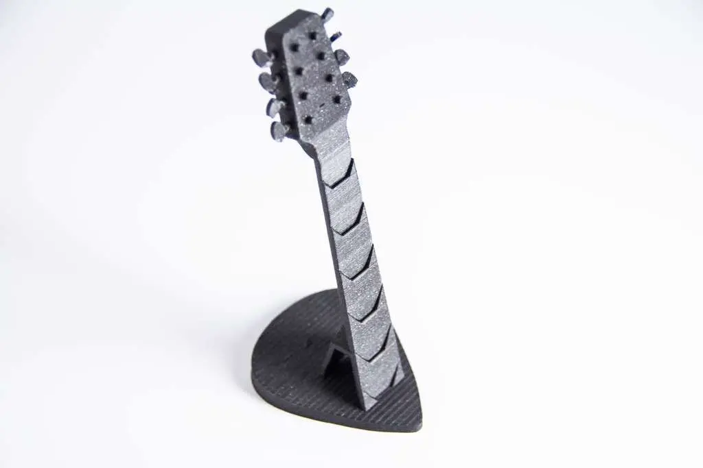 Soporte para púas de guitarra