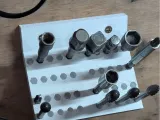 Quarter drive holder 1/4"-0
