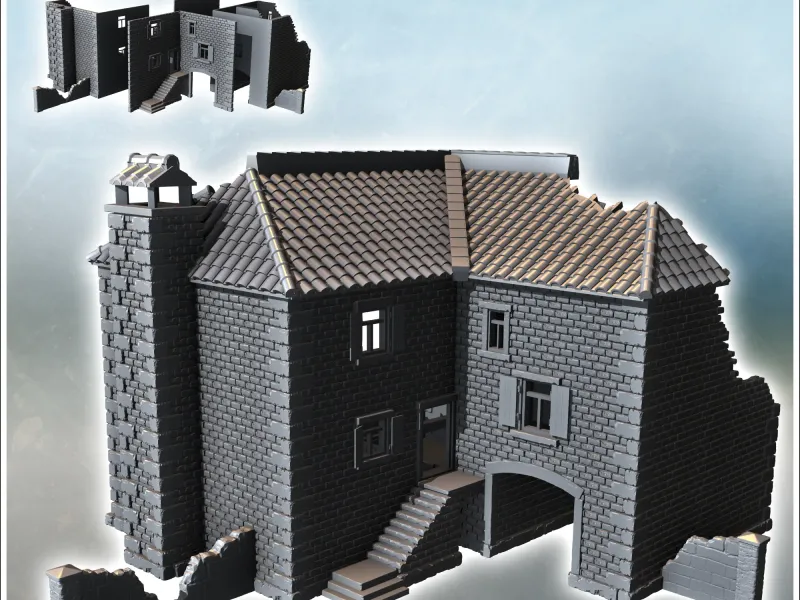 Partially destroyed large brick building with passage arch a