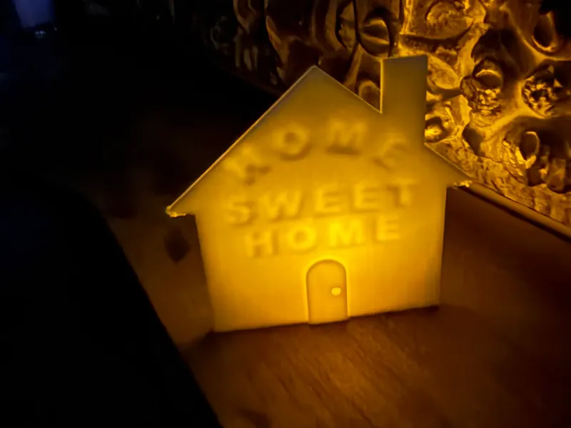Luce a forma di casa