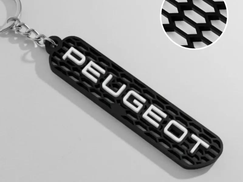 Брелок Peugeot с сотовым узором