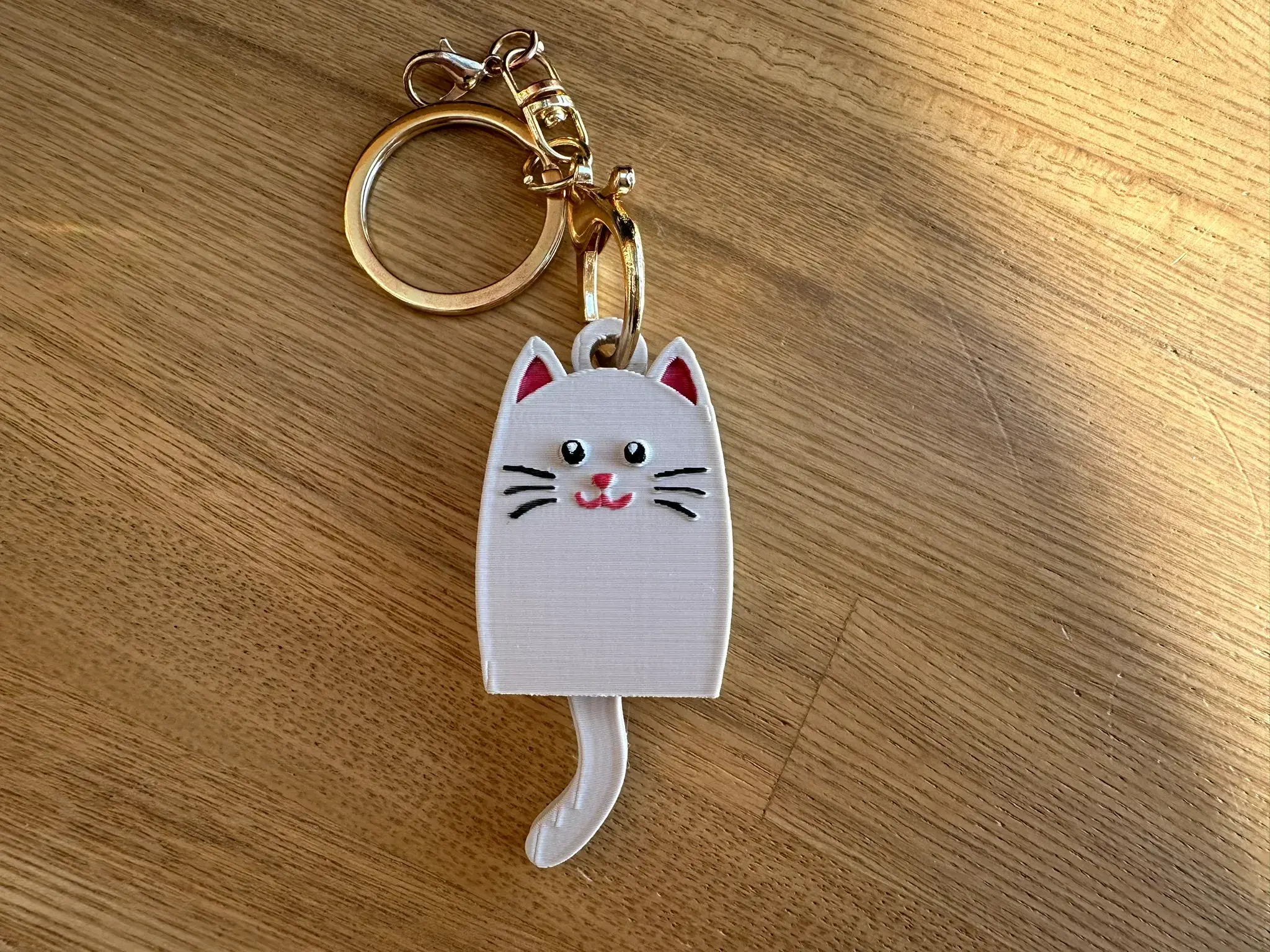 Сat with dangling tail
