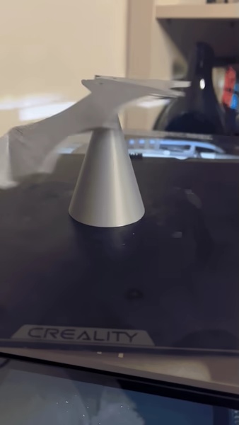 Balanced Bat standing on a tip stand