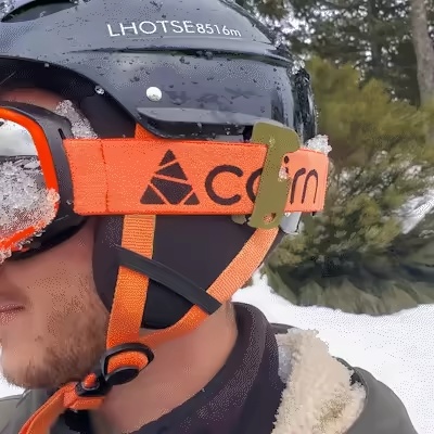 Clip-On Ski Goggle Scraper with Bottle Opener