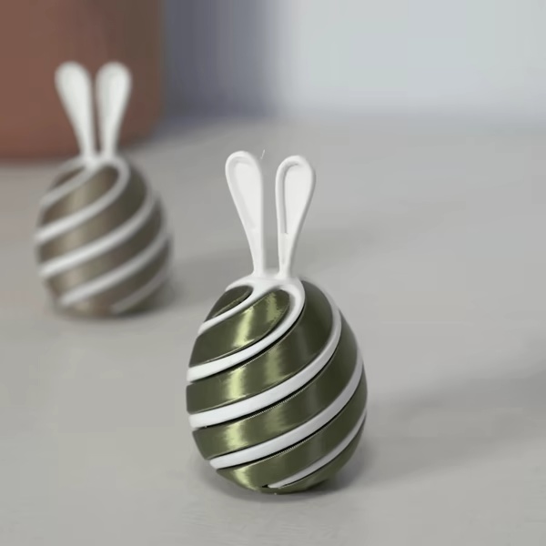 Twist-a-Bun - Jouet anti-stress à torsion en forme d'œuf de lapin, satisfaisant, pour Pâques