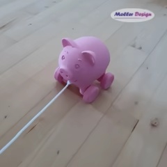 Pig pull along toy