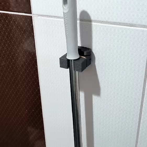 WALL-MOUNTED MOP/BROOM HOLDER