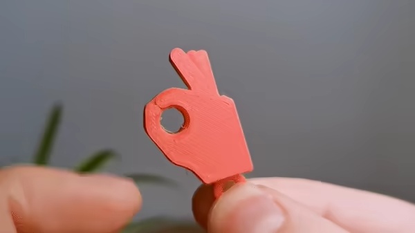 Mini chaveiro de mão Flip OK