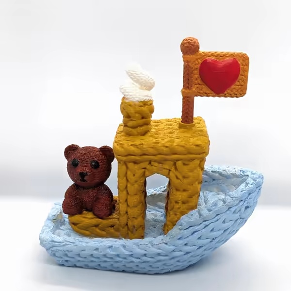 Gebreide teddybeer Benchy (schattig)