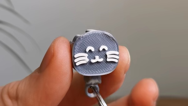 Porta-chaves com mini orelhas de gato Flip