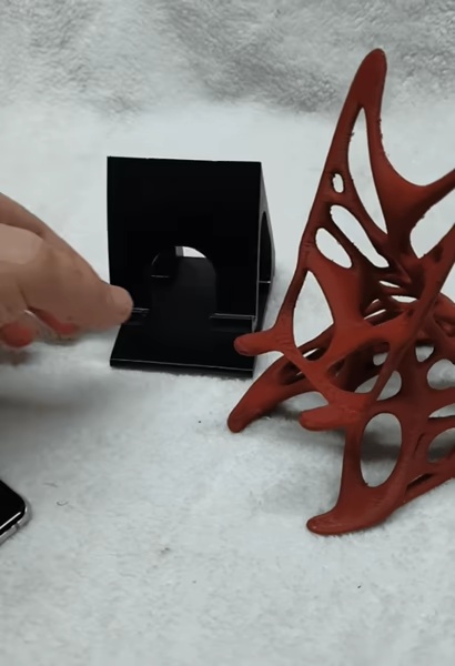 Futuristic phone stand-0