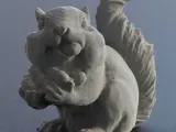 Cute Squirrel eating a Nut-0