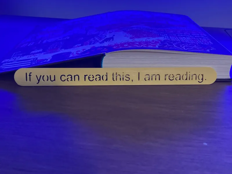 Signet avec le texte : 'Si vous pouvez lire ceci, je lis'