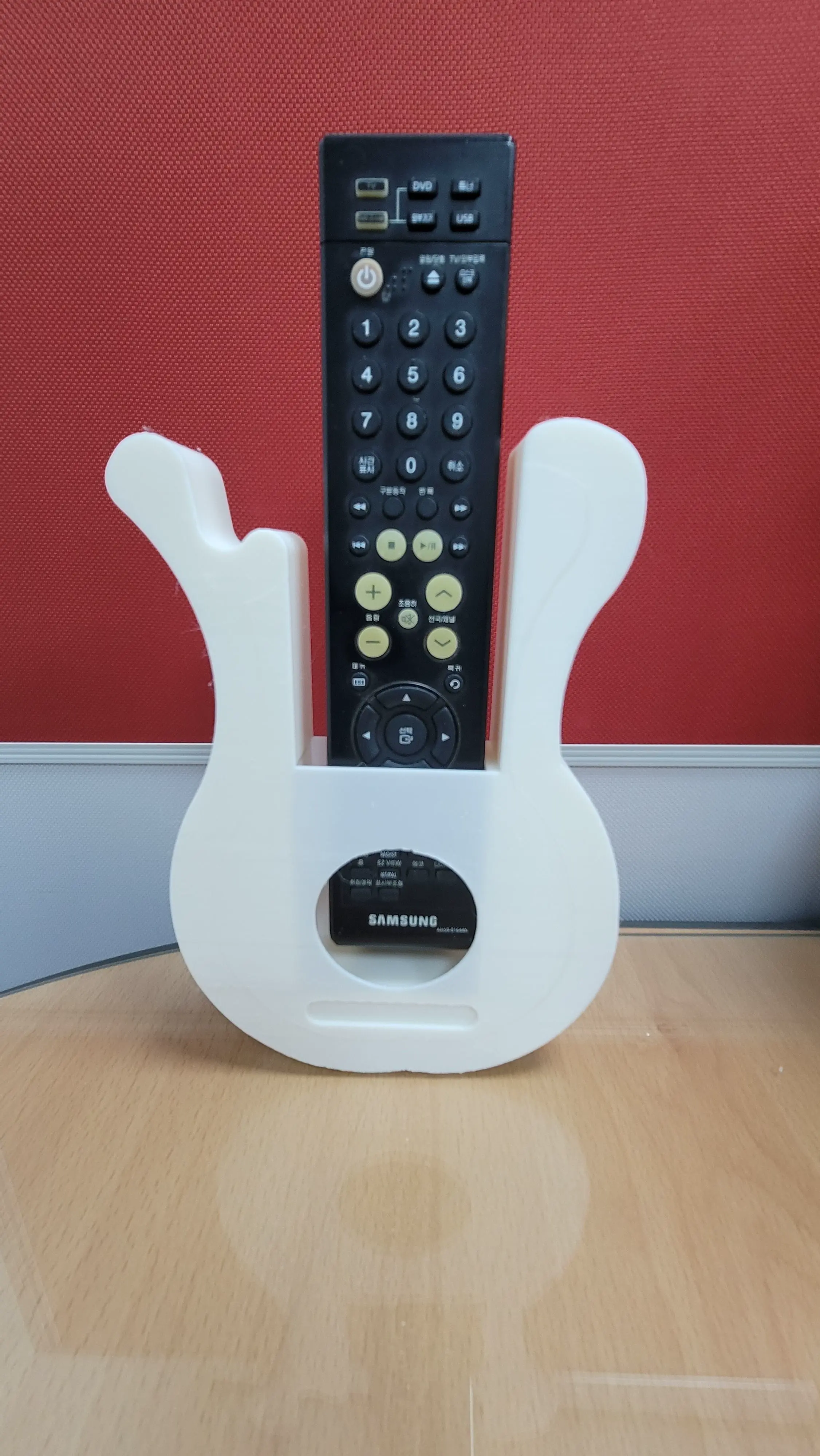 Remote Holder with an acoustic guitar motif
