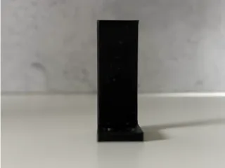 Wall tape hook.