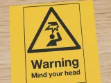 Warning sign: mind your head overhead hazard-0