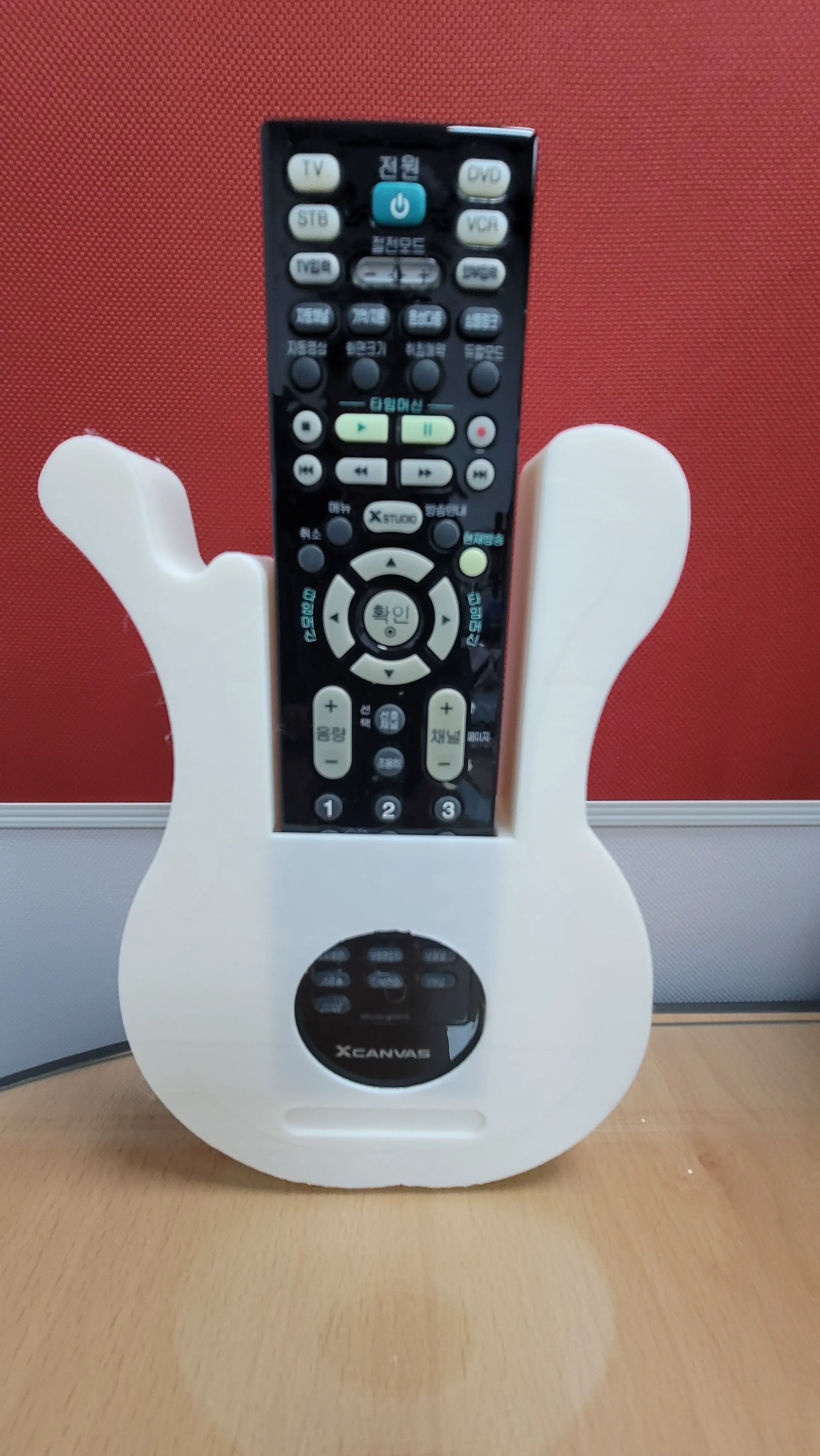 Remote Holder with an acoustic guitar motif