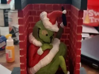 modified grinch fireplace ornament