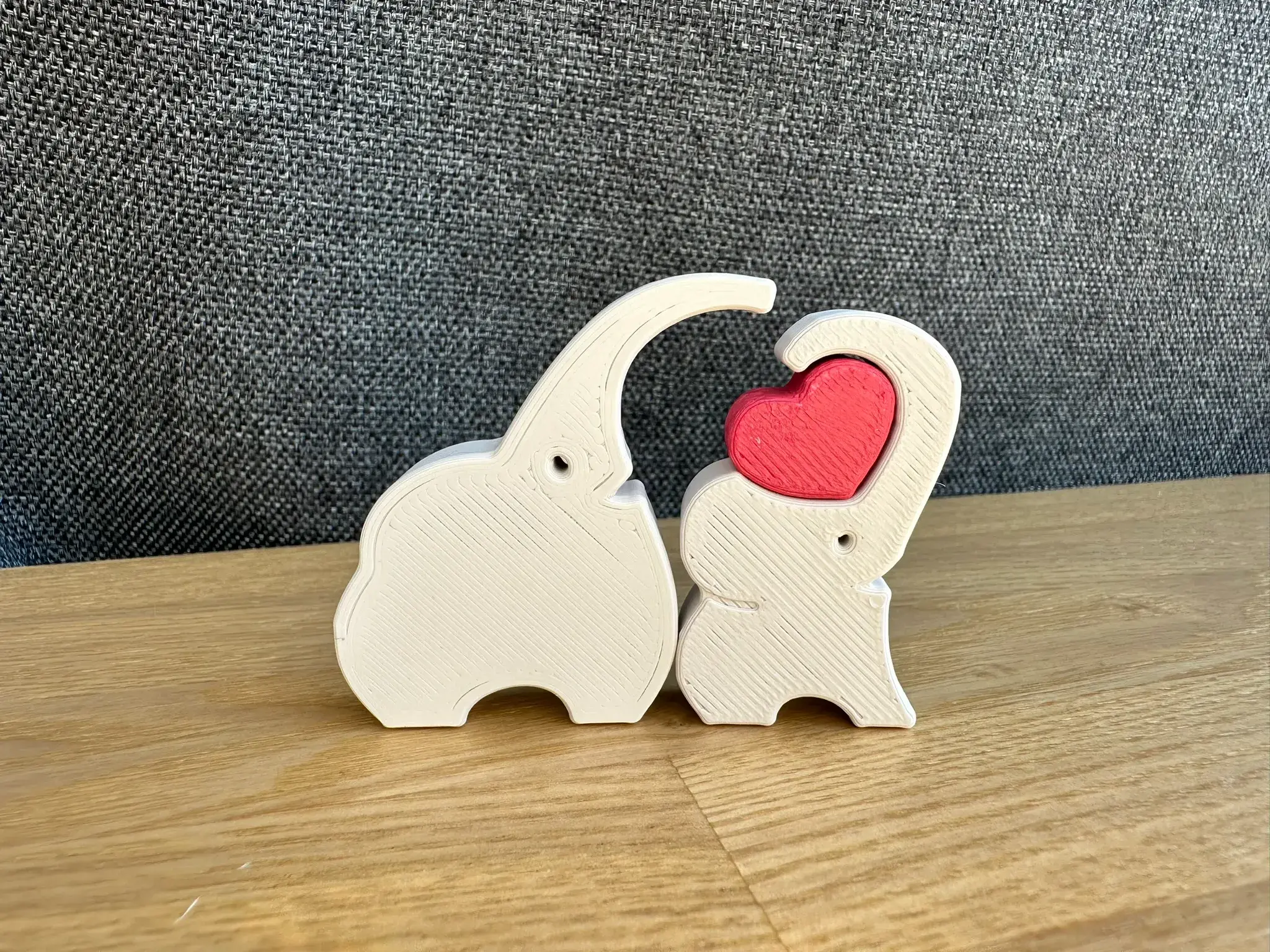 Moederolifant en babyolifant met hart
