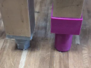 Table leg extender