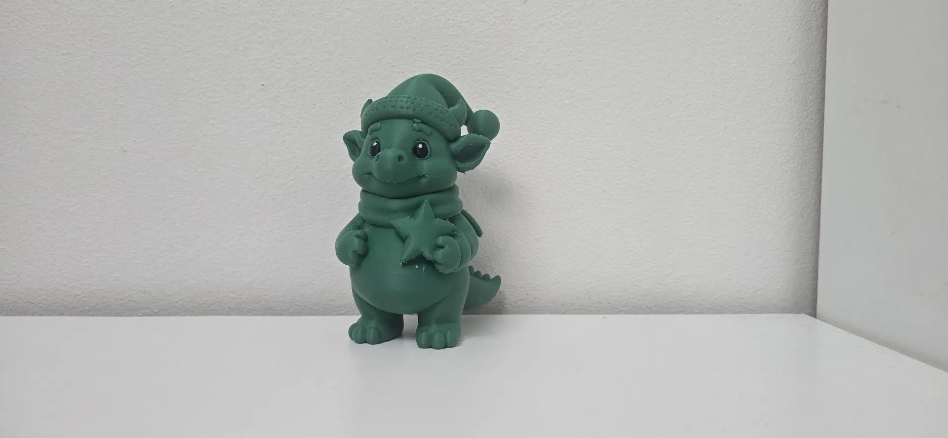 Dragon with Star and Hat Christmas Figurine