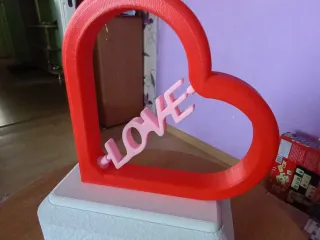 Heart with rotating LOVE text inside and secret compartiment