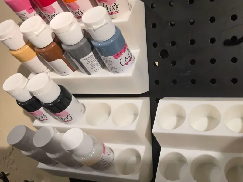 Craft paint holder for peg board