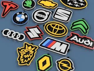 Honeycomb-style keychains with car brand logos. part1