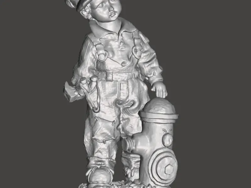 boy beside fire hydrant statue