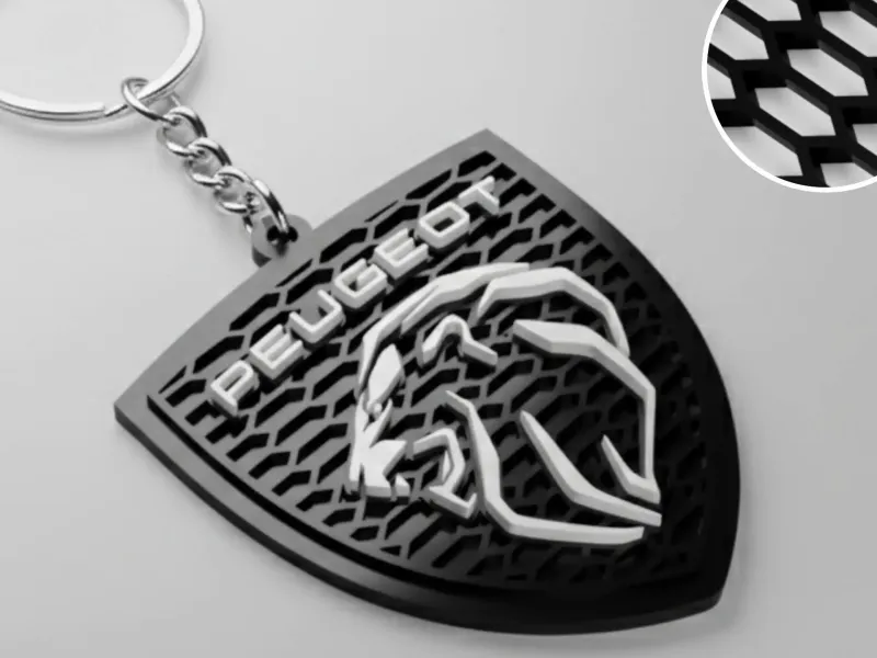 Peugeot Waben-Logo-Schlüsselanhänger