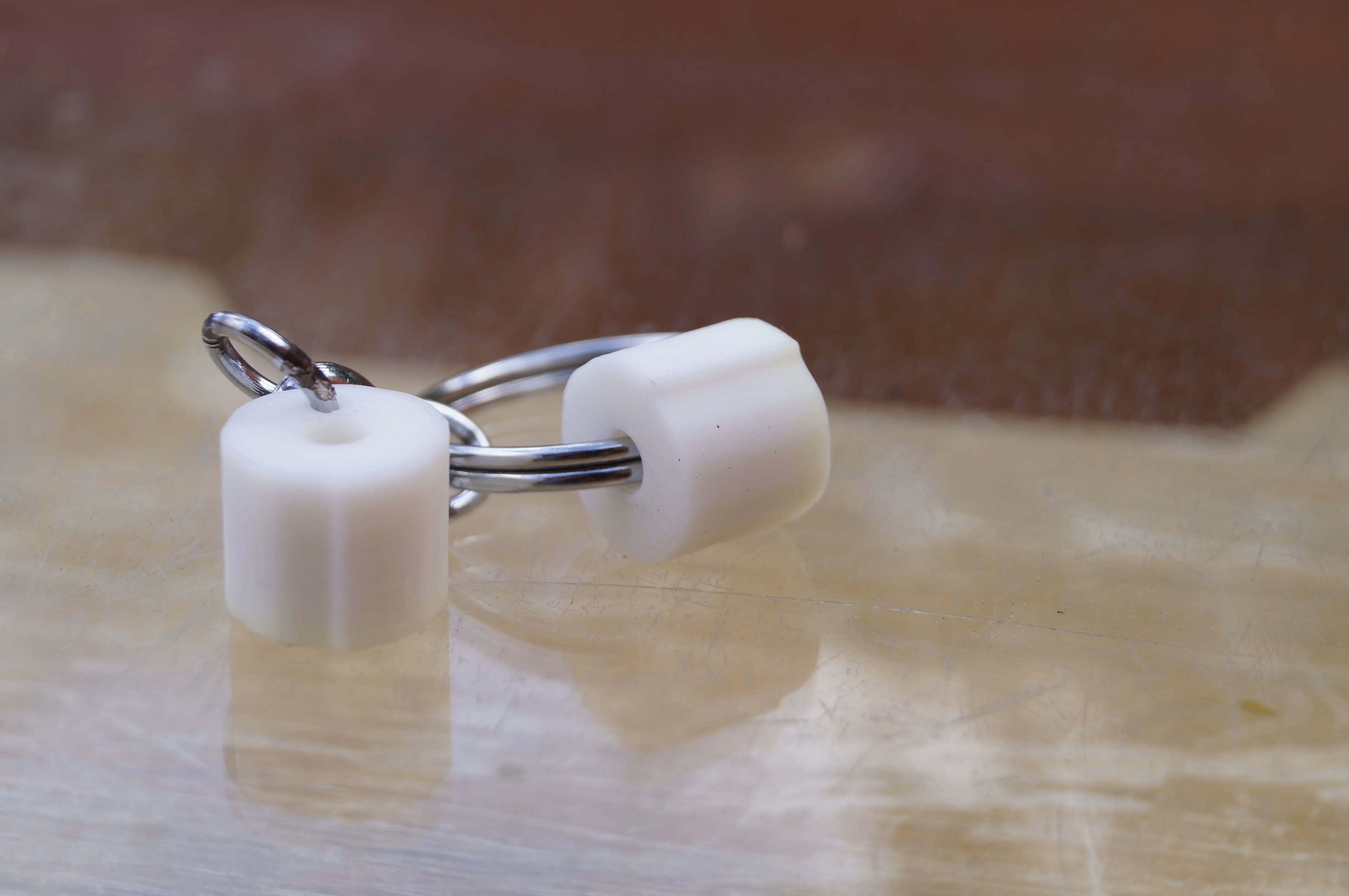 Toilet paper keychain or earring