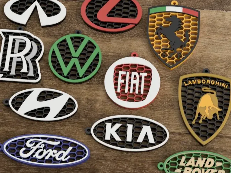 Honeycomb-style keychains with car brand logos. part3