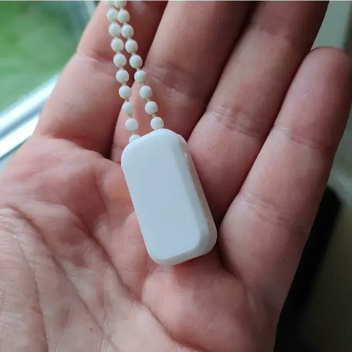 Supporto magnetico per catenella a perline per avvolgibili