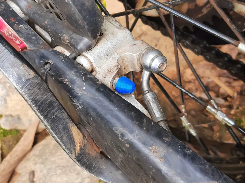 Brake bleed gromet