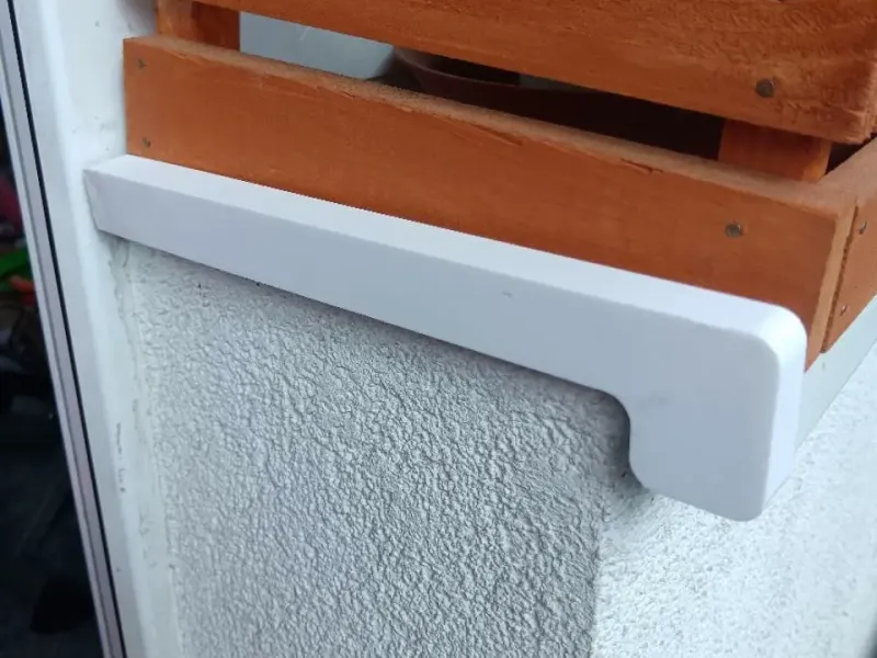 End cap of a balcony windowsill