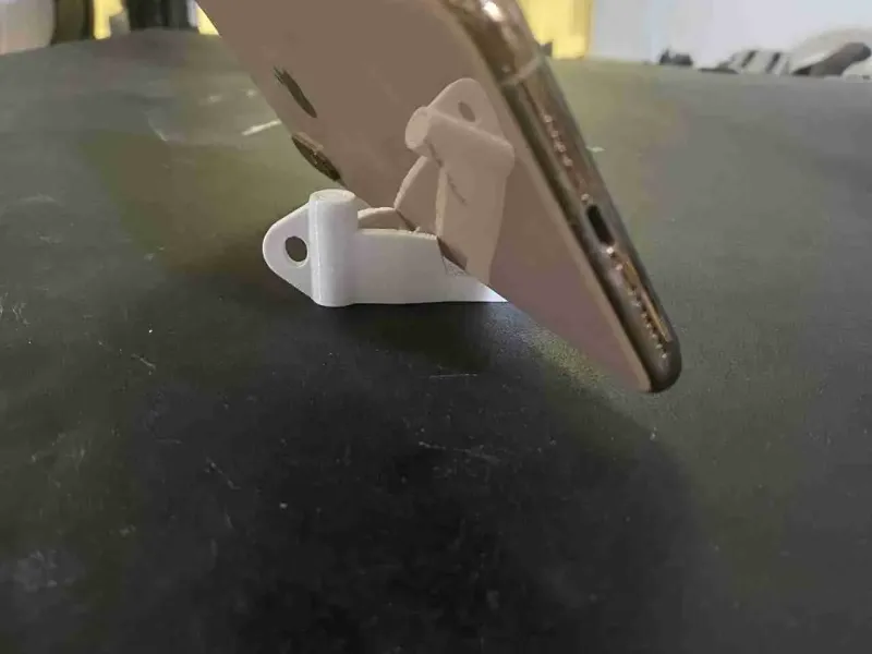 https://cults3d.com/en/3d-model/gadget/foldable-phone-holder