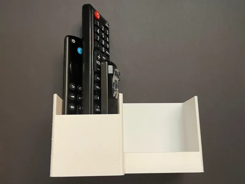Mando a distancia de pared y soporte para teléfono