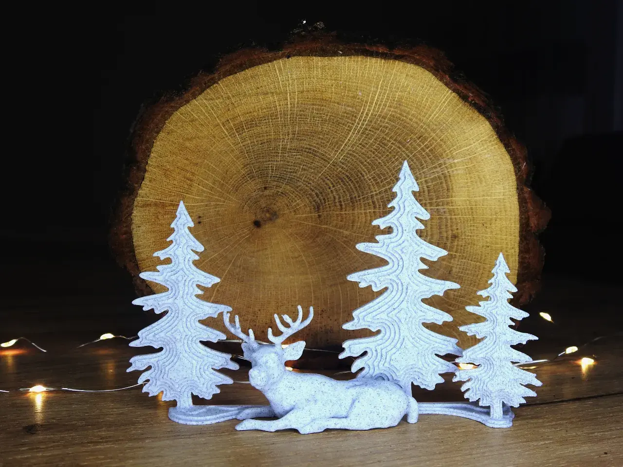 Sleepy deer with trees