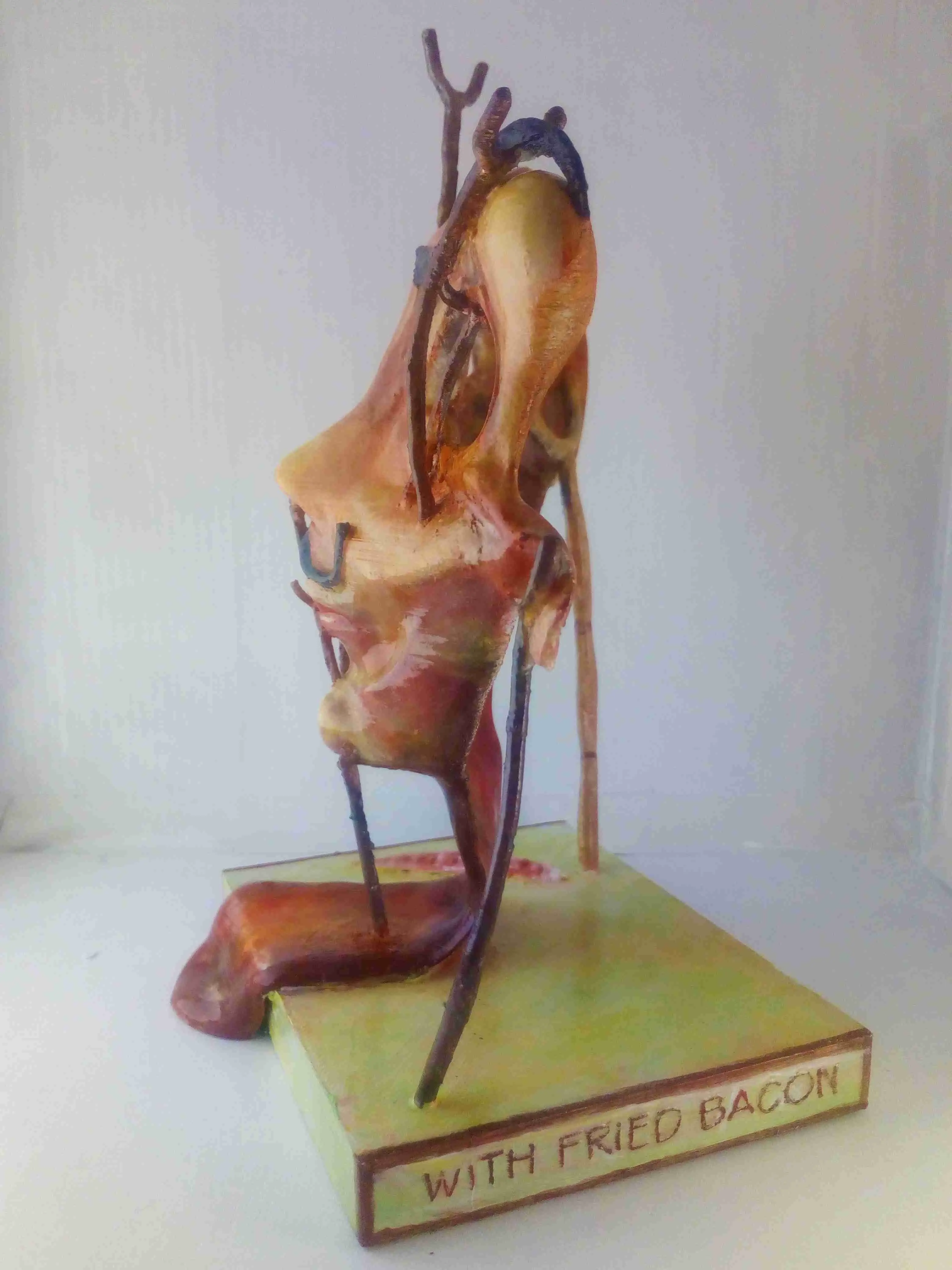 DALÍ SELF-PORTRAIT WITH FRIED BACON