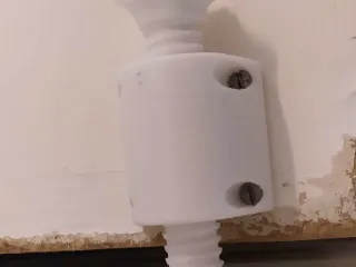 Doorstop (screw on door)
