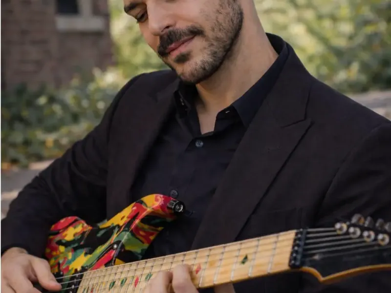 Me test playing guitar