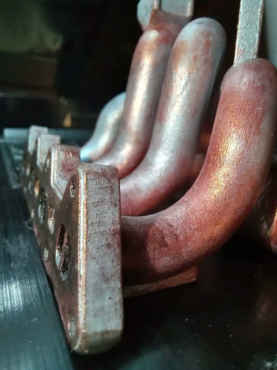 Phone stand- exhaust manifold