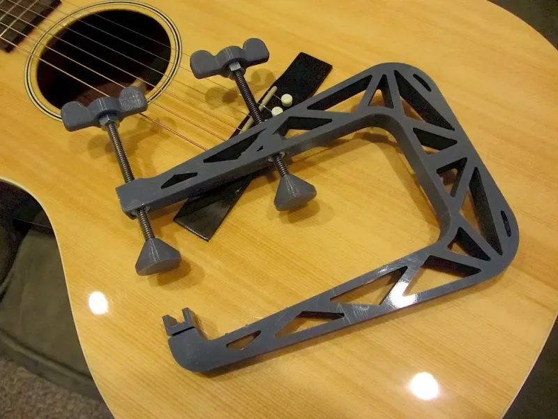 Pince de réparation pour rosace de guitare