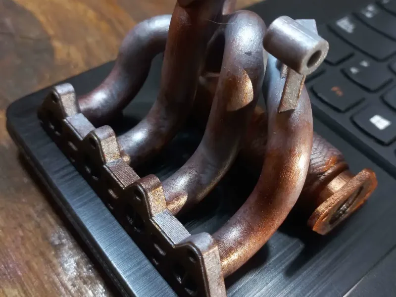 Phone stand- exhaust manifold