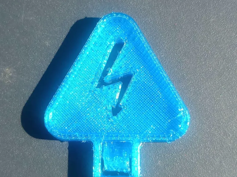 Zip tie with high voltage symbol