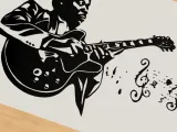 B. B. King playing guitar music-0
